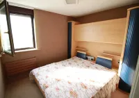 Fantastic view of the North Sea - on the beach promenade with a large balcony Hotels in Westende