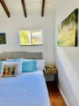 Secluded Island Escape w/ King Bed, Lush Gardens & Shared Pool Access