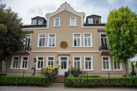 Loft apartment in a historic factory ambience Отели рядом с достопримечательностью «Johannisberg Castle»