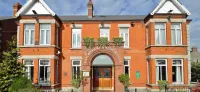 Maples House Hotel - Parkplatz