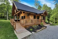 Private & Wooded Cabin with Eat-In Kitchen, Hot Tub, Fire Pit & Game Room