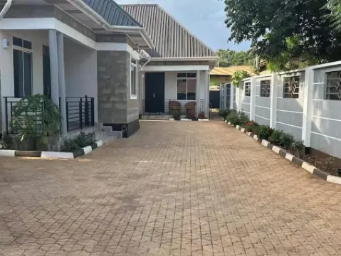 Secure new modern house in central Moshi with AC.