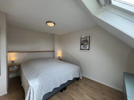 Compact apartment with sunny terrace and extra toilet on bedroom floor.