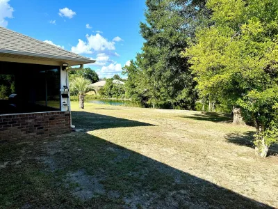 Forget your worries in this spacious and serene space with a beautiful lake view Hotels near Riverwalk South, Milton, FL.