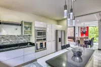 Exquisite 7-Bedroom Mansion in Escazú featuring Heated Pool, Jacuzzi, & Full AC. Hotels in Escazu