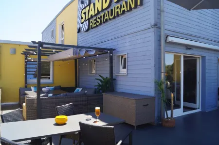 Hotel-Restaurant Stand'Inn Отели в г. Башараж