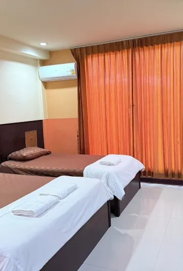 ห้องสำหรับครอบครัวสำหรับสามท่านพร้อมวิวสวนหย่อม