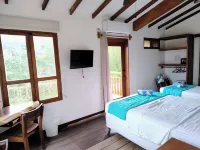 FOREST VIEW AND OCEANFRONT VIEW - SEVERAL OUTDOOR SPACES  - DIRECT BEACH ACCESS Hoteles en 