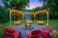 Scenic Riverfront Escape: Game Room, Fire Pit, King Bed - 4-Star