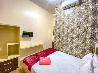 Tini's Guest House Malang Mitra RedDoorz Hotel dekat Toko ATK Ali Bin Abi Tholib