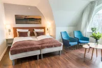 Sixtus Sinatur Hotel & Konference