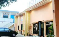 Hotel Simpang Empat Hotel dekat Kelenteng Kelapa Kampit
