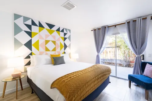 Spin Some Vinyl at a Lush Green Retreat with Two Bedrooms