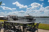 Screened porch and private pier on False River