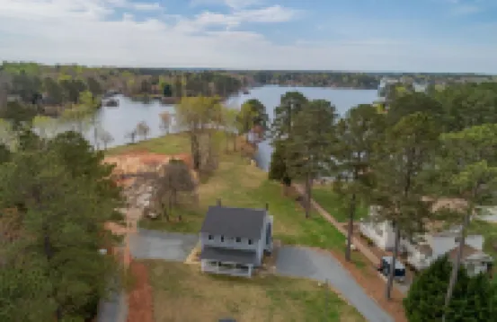 LAKE FRONT WITH GORGEOUS VIEWS & SPACIOUS BACKYARD + LOTS OF AMENITIES