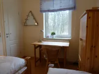 Bright and friendly apartment with comfortable amenities near the beach.