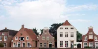 Fantastic, modern holiday apartment "Stüürhuus" in the fishing village of Greetsiel Hotels in Greetsiel