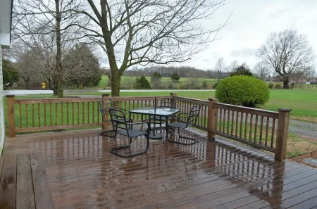 Country Setting with Mature Trees, Large Deck. Game/Rec Room, Fire Pit and Grill