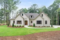 5 minutes from Robert Trent Jones Grand National. 5 bedrooms and 3.5 baths.