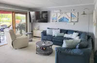 Discover lake life living at its finest in our 2 bedroom  on Lake Winnipesaukee! Hotels in Laconia