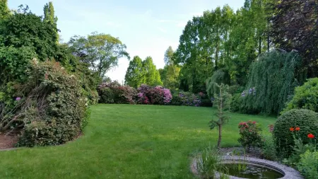 Vacation apartment "Kaminzimmer" in the 2-stall country house in the Rhodo garden.