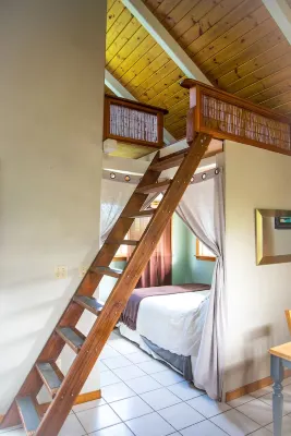 Bright, clean, airy Rocky Point Beach 1 bedroom loft. Steps to beach & bike path Hotels near Banzai Pipeline