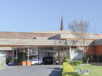 The Mid City Motor Lodge Hotels near CHAPMANS Guitars and Music