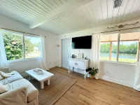 The Bonita Bitty Cottage -2 bed/1 bath waterfront cottage a mile from the beach!