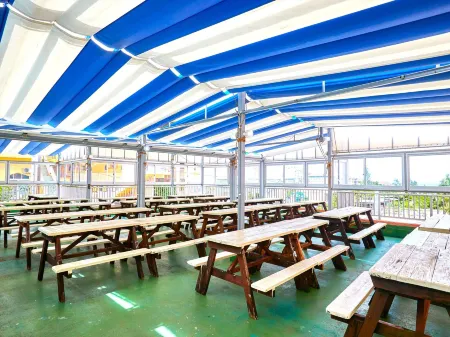 Condo Hotel Shimanchu Club Отели рядом с достопримечательностью «Onna Seaside Cizil Park Nabii Beach»