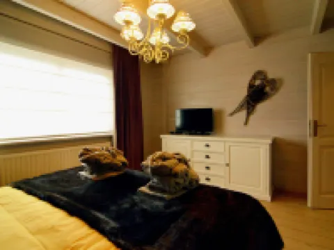 วิลล่าหรูหราพร้อมซาวน่า, อ่างน้ำร้อน, ห้องสันทนาการ, สวนกว้างขวางที่มีรั้วล้อมรอบ โรงแรมใน