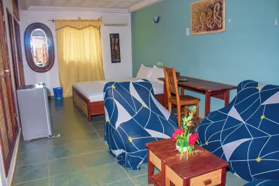 Abomey Event Hoteles cerca de Place GOHO