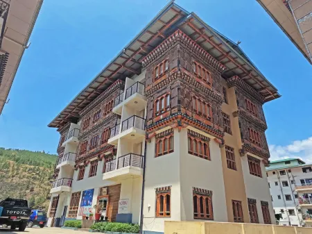 Norbu Healing Hotel Отели в г. Юзипанг