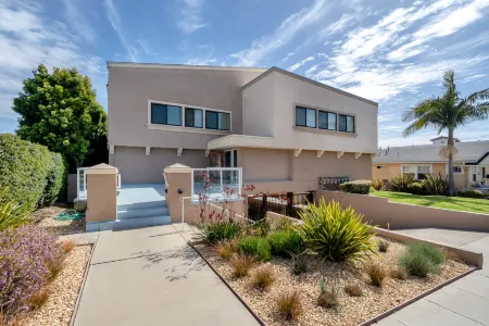 Charming Condo with Private Deck and Gated Parking - Serene Coastal Retreat