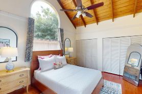 Colorful condo by the beach with a washer/dryer, lanai, & on-site pool