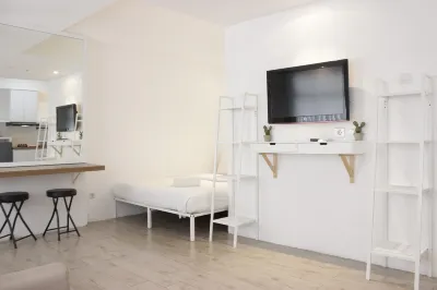 Modern Chic Studio Room at Grand Asia Afrika Apartment Hotels in Paledang