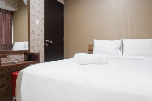Minimalist 2Br Apartment at Tamansari Papilio Hotels in Gayungan