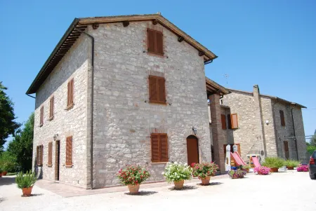 Agriturismo"Il Sagrato di Assisi" Appartamenti,Camere