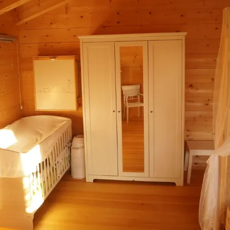 Fantastic apartment in a log cabin in front of the mountains