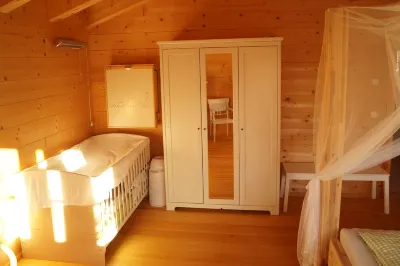 Fantastic apartment in a log cabin in front of the mountains