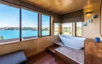 Designer living with stunning views across the bay, a spa and coast walks.