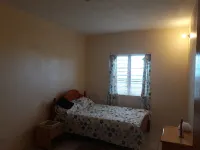 Spacious 1 bedroom Apartment to rent in Montserrat West Indies. Cudjoehead 호텔