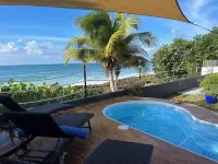 Ocean Front Home with 3 Suites, Salt Water Pool, Gated and Wifi. Gas BBQ Grill. Hotels in Arecibo