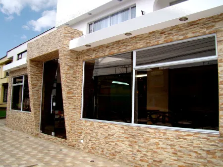 Hotel Boutique Feria Internacional Отели рядом с достопримечательностью «Университет Насьональ де Колумбия»