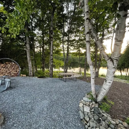 Cozy lakeside glamping dome with fireplace, AC and full bath.