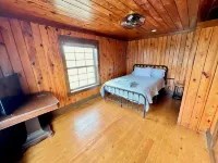 The Stone Schoolhouse - Gated Lakefront Acreage with views and historic charm