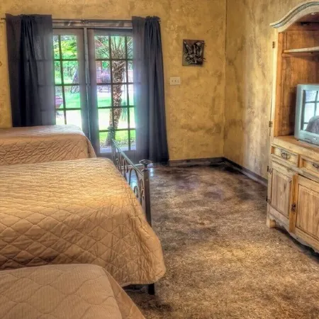 6-bedroom Lodge on 12 acres in Concan, Texas.  Swimming pool & hot tub.