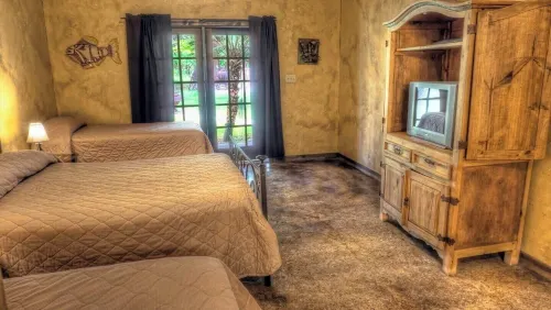6-bedroom Lodge on 12 acres in Concan, Texas.  Swimming pool & hot tub.