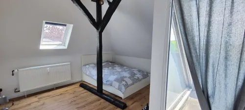 Lovingly converted 90 sqm attic apartment. Experience idyllic Selfkant. Hotel a Heinsberg