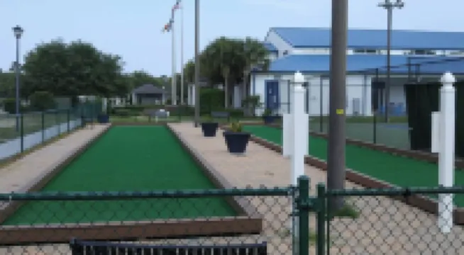 “Tiki time Getaway” -dog friendly, sleeps 6. Corner of splash pad and pool.