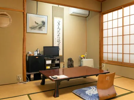 Tsutaya Ryokan Отели в г. Мицукэ